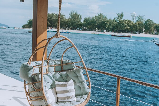 4-in-1 • Gili Islands Half-day Snorkel & Lunch Catamaran Tour - Onboard Fun Time Between Snorkeling Stops