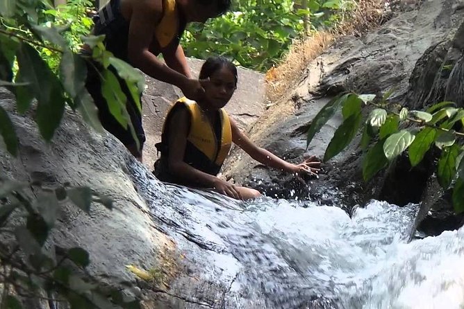 Aling-aling Waterfall tours - Stop 1: Aling-Aling Waterfall, the swimming and slide stop