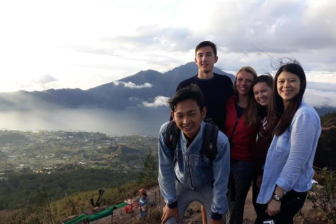 Amazing Mount Batur Sunrise Trekking and Hot Spring - Reaching the summit for sunrise: the payoff moment