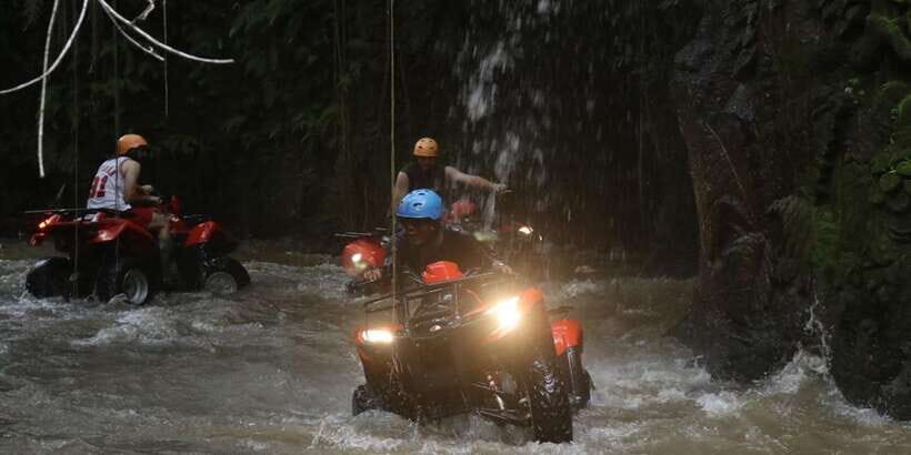 Bali: ATV Gorilla Cave, Ubud Monkey Forest, & Waterfall Tour - ATV quad biking through Gorilla Cave: safety gear and real jungle grit