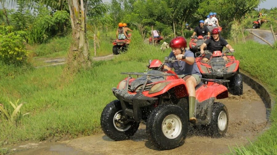 Bali: ATV Quad Bike, River Tubing Adventure All Inclusive - Quad bike time: rice fields, mud, waterfalls, and tunnels