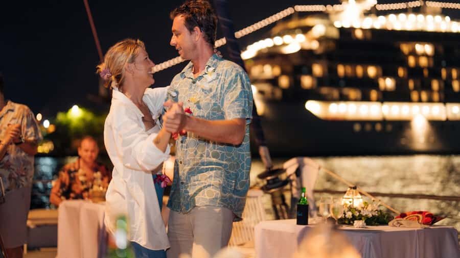 Bali/Benoa: 5-Course Romantic Evening Cruise With Live Music - Entering Benoa: lei, welcome drink, and the start of your night