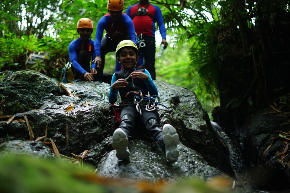 Bali: Gitgit Canyon Canyoning Trip with Breakfast and Lunch - Entering the canyon: jumps, slides, abseils, zipline, and swim time