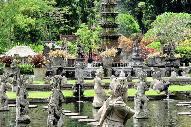 Bali Instagram Tour : Heaven Gate Tour - Tirta Gangga - Tukad Cepung Waterfalls - Tirta Gangga Water Palace: koi, carvings, and an 11-tier fountain