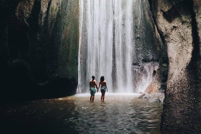 Bali Instagram Tour: Lempuyang Temple, Tirta Gangga and Tukad Cepung Waterfall - Tukad Cepung Waterfall: cave sun rays and a short jungle walk
