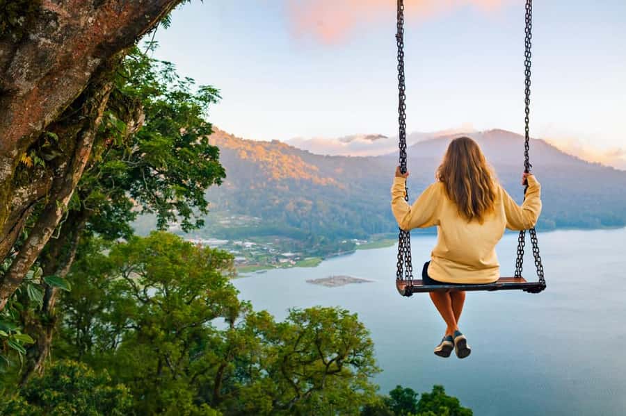 Bali: Lake Bratan, Handara Gate, Waterfall & Swing Tour - Handara Gate: Forested Highland Views and a Classic Split-Gate Moment
