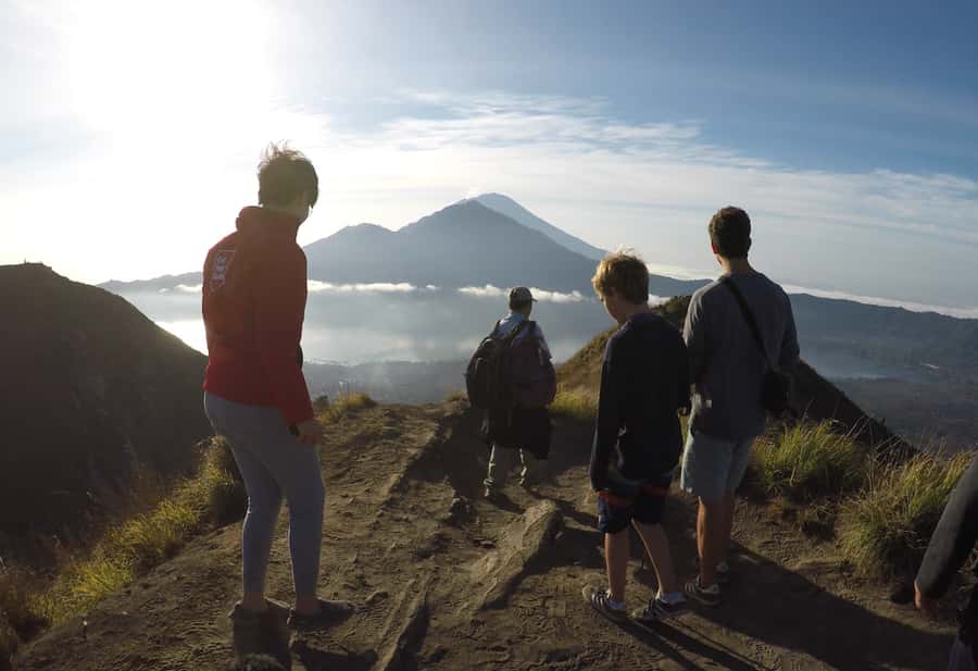 Bali: Mount Batur Sunrise Hike and Hidden Waterfall - The torchlight trek: timing, footing, and how guides help