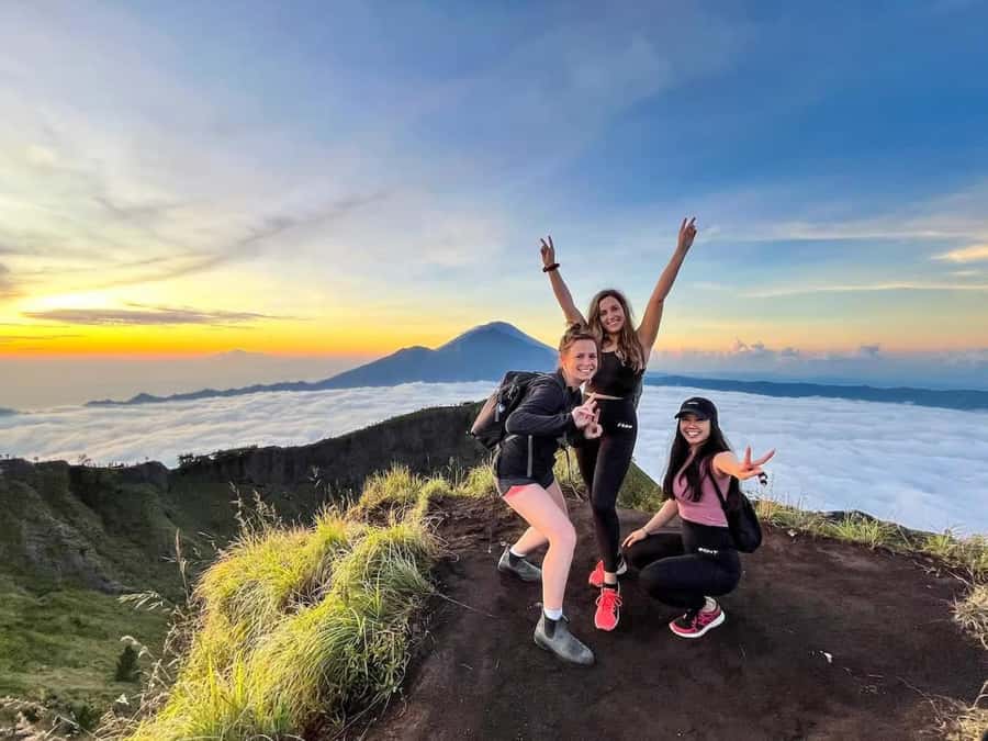 Bali: Mount Batur Sunrise Trek & Ubud Zip-Line Adventure - Reaching the Summit: The Sunrise Moment Over Caldera, Lake Batur, and Beyond