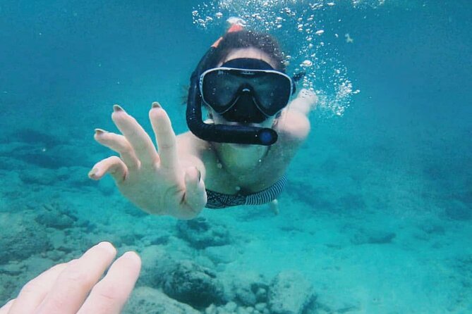 Bali Snorkeling at Blue Lagoon with Transport and Lunch - Snorkeling gear, safety, and boat time: how to make it easier