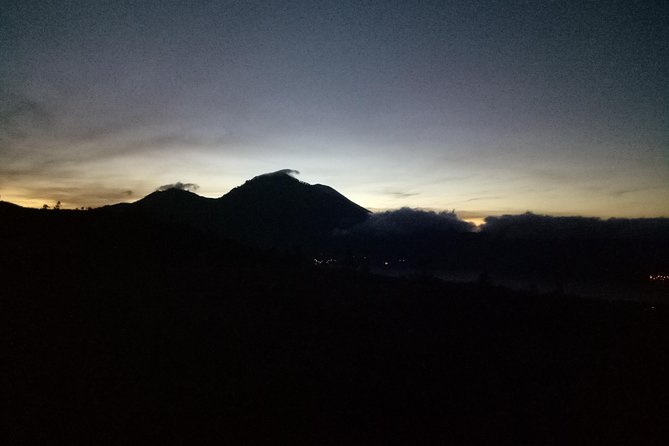 Bali Sunrise Trekking and Natural Hot spring Tour - Trekking up Mount Batur at night: pace, clothes, and the flashlight help
