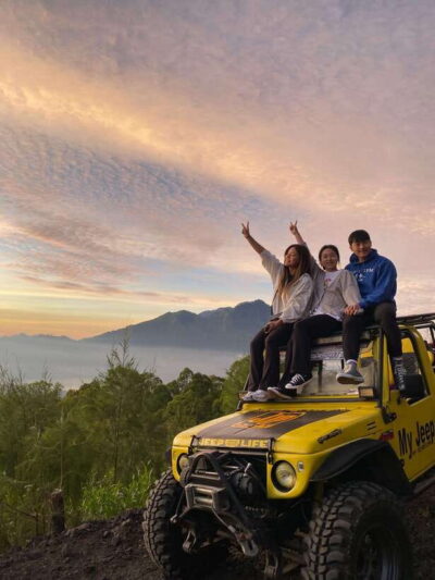 Bali: Sunset Mount Batur Jeep and Hot Spring All Inclusive - Hotel pickup and the noon start: how the day flows