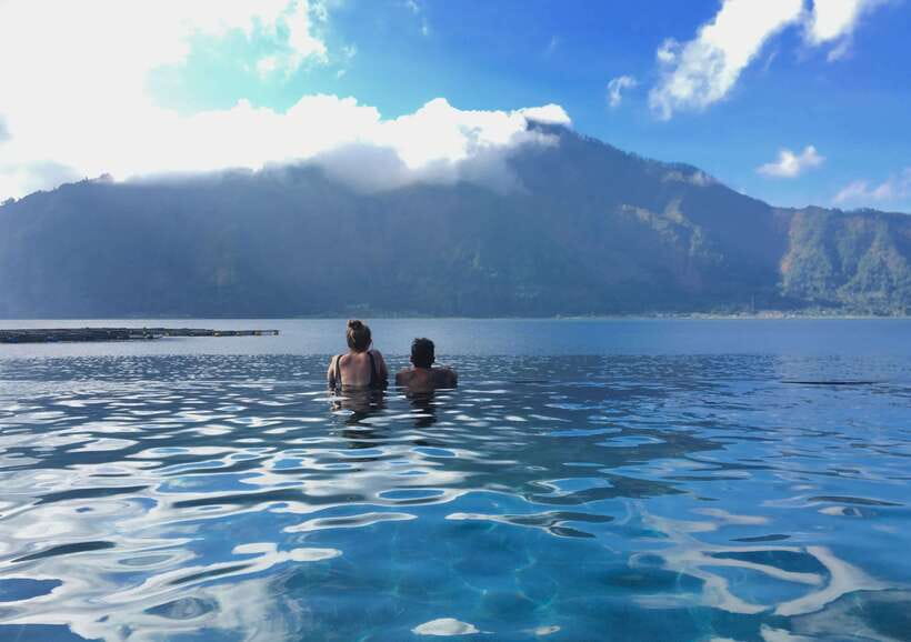 Bali: Sunset Mount Batur Jeep and Hot Spring All Inclusive - Riding higher for black sand sunset: what to expect when clouds show up