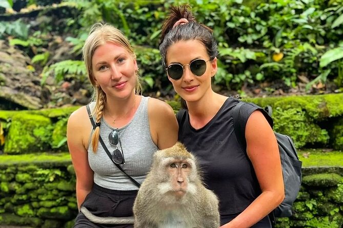 Bali Swing, Monkey Forest and Waterfall Private Tour - Kanto Lampo Waterfall: tiered rock steps and a refreshing break in Gianyar