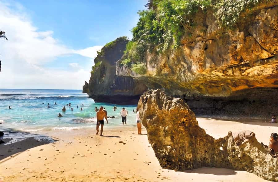 Bali: Uluwatu Beaches Tour with Padang Padang and Suluban - Padang Padang: the big rock, soft sand, and Eat Pray Love fame