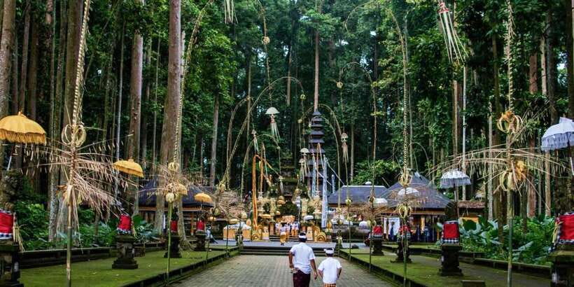 Bali's Golden Embrace: Dazzling Tanah Lot Sunset Expedition - Ulun Danu Bratan Temple by Lake Beratan: Calm Water, Big Meaning