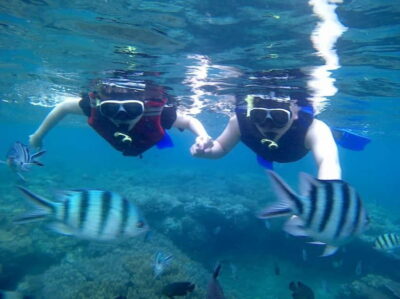 Blue Lagon Snorkeling, Waterfall, and Celuk Village Tour - Tukad Cepung Waterfall in a Cave: photos, swimming, and the walk there