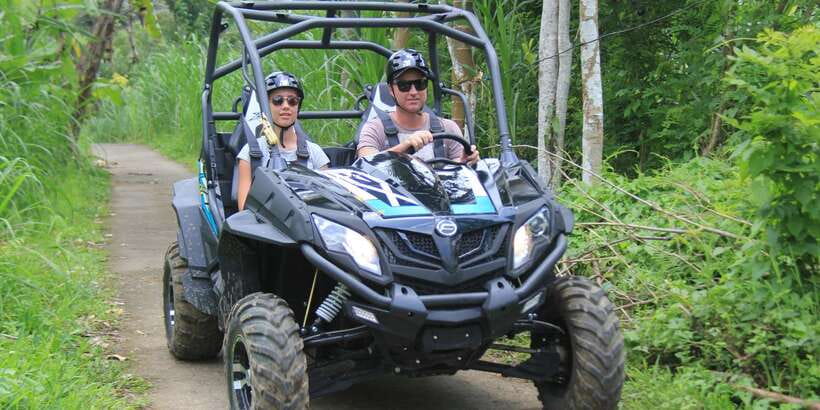Buggy Discovery and Canyon Tubing Adventure - Hidden Canyon Tubing: Clear Water, Gentle Conditions, and Rain-Forest Details
