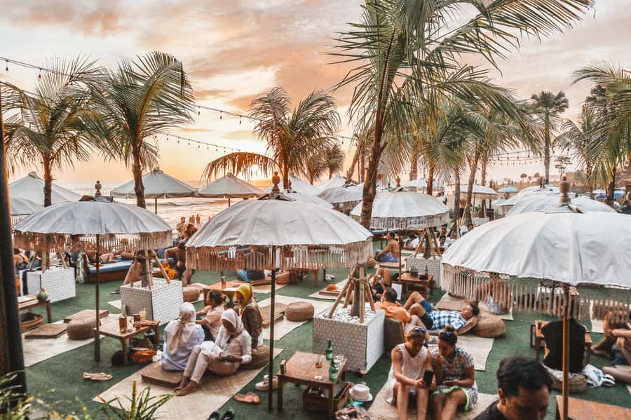 Canggu: Surfing Class, Tanah Lot & Kecak Dance Sunset Tour - Tanah Lot Temple at sunset: photos, dress rules, and timing