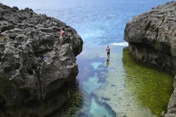 Day Trip to Nusa Penida with All Inclusive - Kelingking Beach: the T-Rex cliff and why timing matters