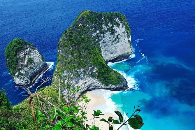 From Bali: Nusa Penida Snorkeling and Island Tour - Transportation and people: AC car, English-speaking driver, and name-board welcome