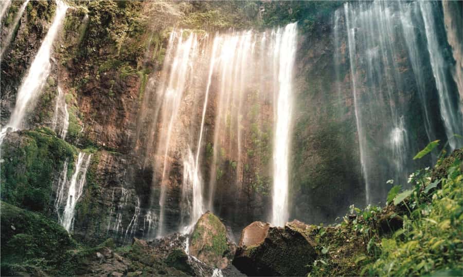 From Malang or Surabaya: Private Tumpak Sewu Waterfall Tour - First viewpoint at Tumpak Sewu: that dewy curtain moment