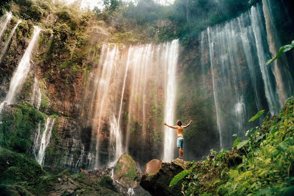 from malang : tumpak sewu waterfall with guide - Exploring the cave area for quieter waterfall views