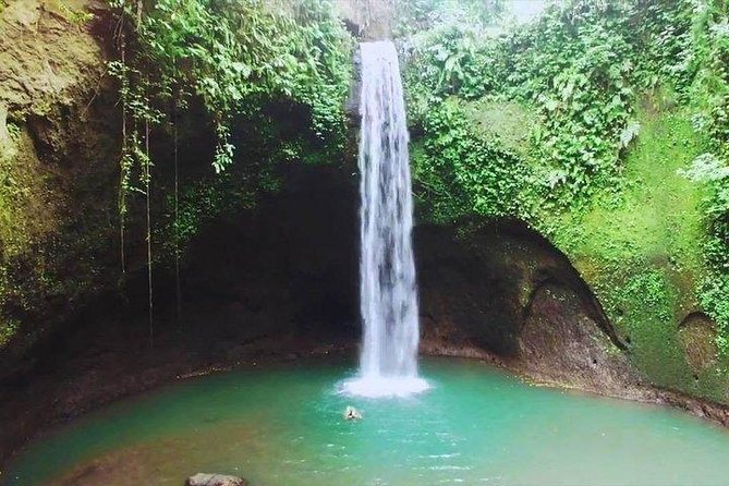 Full-Day Bali Private Customized Tours Create Your Itinerary - Stop 3: Tukad Cepung waterfall inside the cliff frame