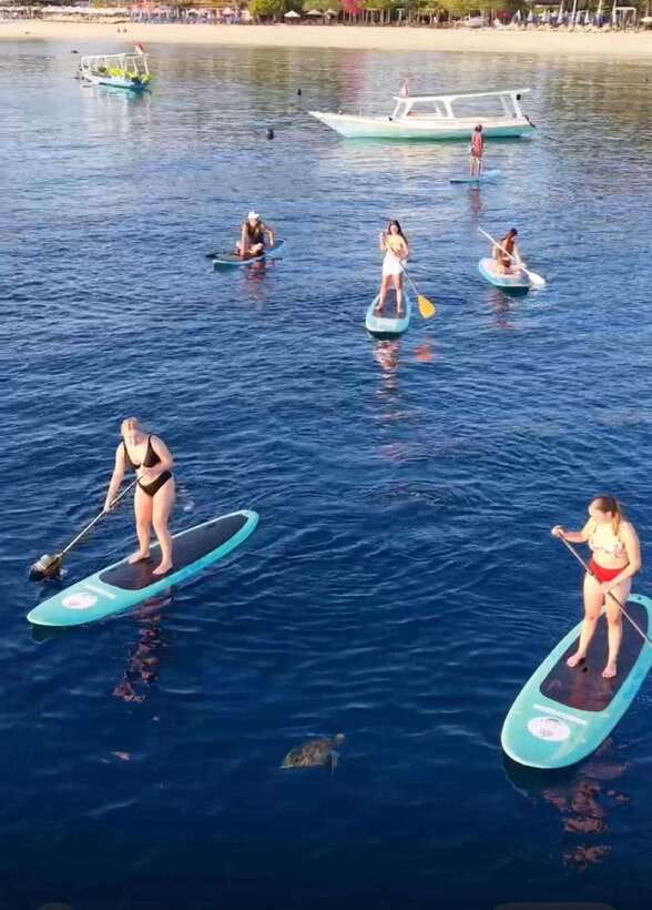 Gili sunrise stand-up paddle boarding (drone photoshoot) - Sunrise on Gili: Why 5:30 am Changes Everything
