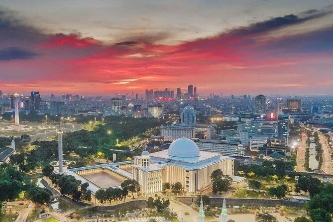 Jakarta Walking Tour with Public Transportation Visiting Sites - Jakarta Cathedral across the street from Istiqlal