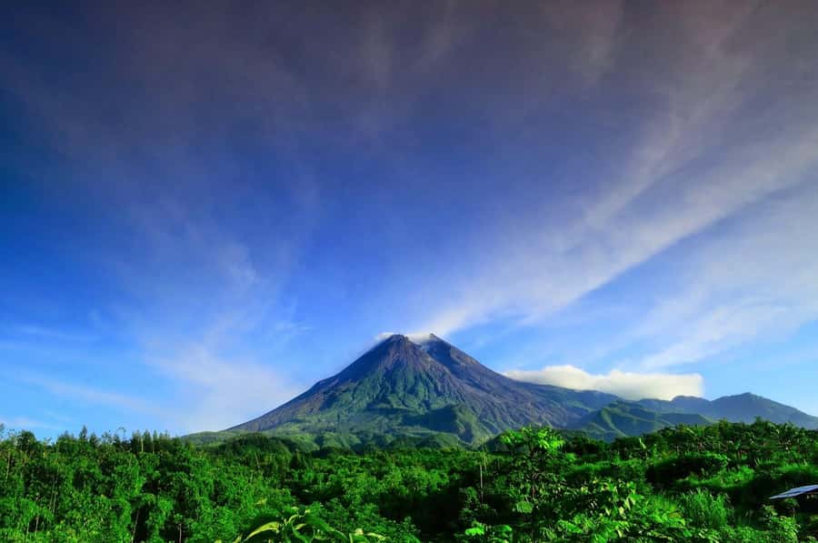 Merapi volcano sunrise with 4wd jeep and step on cold lava - Catching the Golden Sunrise on Mount Merapi