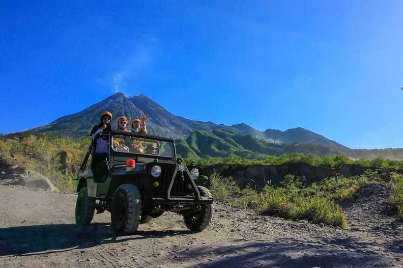 Merapi volcano sunrise with 4wd jeep and step on cold lava - After Sunrise: River Crossing and Mountain-Water Spray