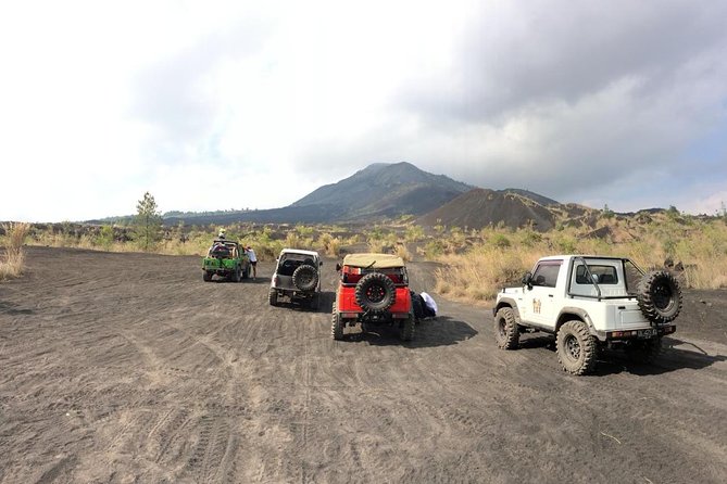 Mount Batur Jeep Sunrise & Overnight Glamping Experience - Jeep time after sunrise: black lava, sand fields, and a fun kind of rough