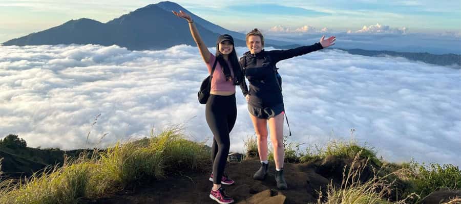 Mount Batur: Sunrise Dirt Bike Trek with Trained Riders - Sunrise at the summit: clouds, gold light, and that breakfast stop