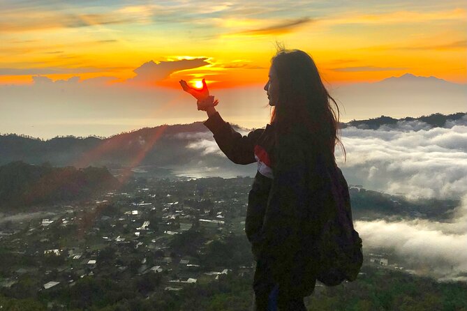 Mount Batur Sunrise Trekking and Hidden Waterfall - Flashlight Trek to the Top: Poles, Pace, and Safer Steps