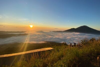 Mount Batur Trekking and Natural Hot Spring - All Inclusive Tour - The hike up Mount Batur: crater rim views, rocky footing, and guide support