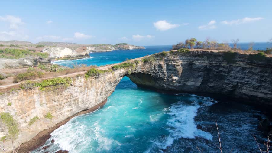 Nusa Penida Tour : Day Trip from Bali - Hotel Transfer - Kelingking Beach: the cliff-arc view you’ll aim for first