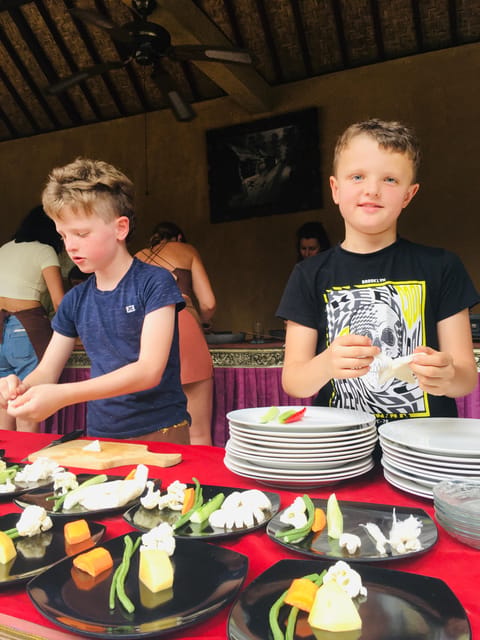 packages cooking class and romantic dinner in a local home - The romantic setup: candles, flower petals, and eating in the right mood