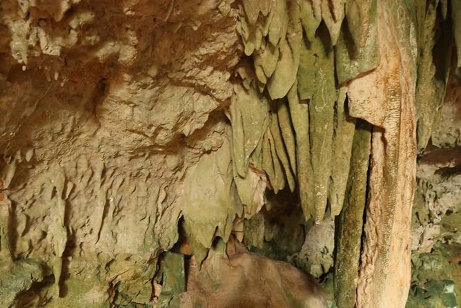 Private Day Tour Rangko Cave -Batu Cermin Cave - Stop 2: Goa Batu Cermin (Mirror Rock) and the reflected-light tunnel effect