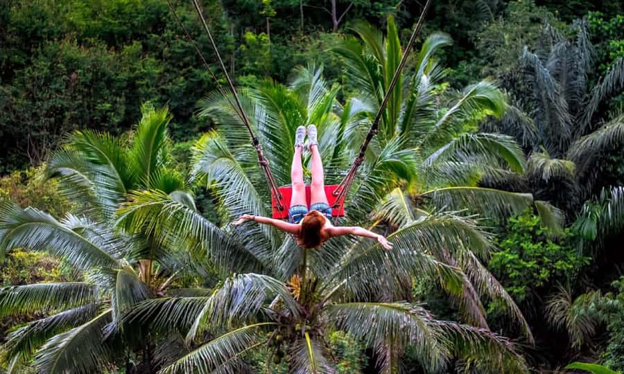 Private Full-Day Tour to the Real Bali Swing and Ubud - Kanto Lampo Waterfall: wading in the jungle, not just posing