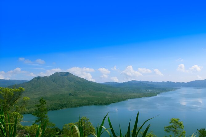 Private Full Day-Tour: Ubud Waterfall and Kintamani Volcano Trip - Stop 2: Tirta Empul Temple’s holy spring and the good-vs-evil story
