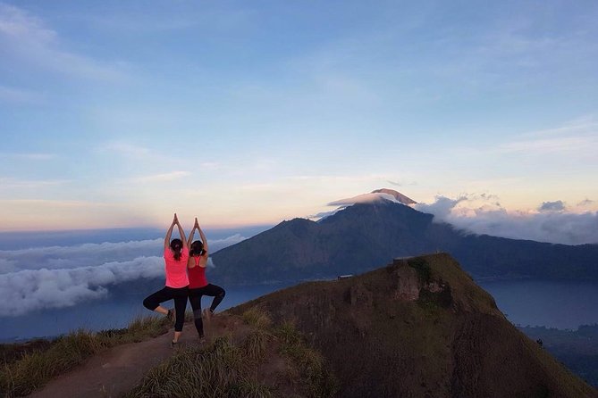 Private Mount Batur Sunset Trekking - All inclusive tour - The hike itself: sticks, volcanic rocks, and staying steady