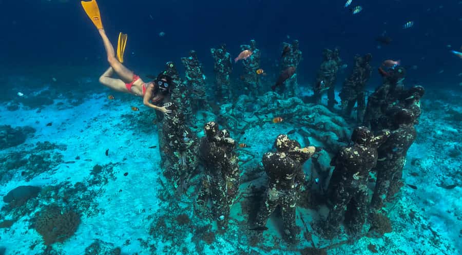 Private Snorkeling Gili Islands Full Day Tour - On the water with a private glass-bottom boat