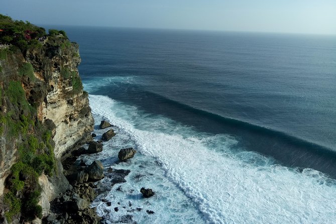 Private Tour Bali Beaches and Uluwatu Temple with Dinner - Melasti Ungasan: Cliff Rims and a Scenic Pause Before the Show