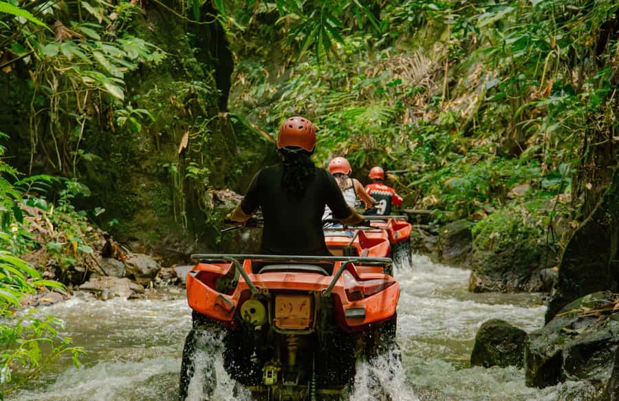 Quad Bike Bali With Tunnel & Waterfall Tour - Big Waterfall Stop: The photo moment that breaks up the action