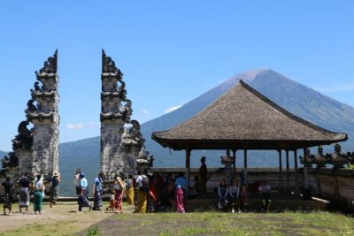 See The Gate of Heaven at Lempuyang Temple in Bali - Tirta Gangga Water Palace: pools, pavilions, and royal-era atmosphere