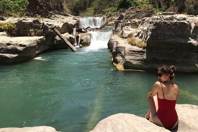 Sumba Adventure 5 Days 4 Nights - Day 2: Praijing weaving village, Lapopu falls, and a hill for sunrise or sunset