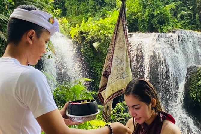 Taman Beji Griya Waterfall Tranquil Purification Ceremony - Waterfall views: pathways, viewing platforms, and the pool at the base
