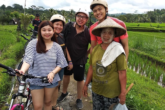 Ubud Cycling Tour - Beyond the Bike: Woodcarving, Temples, and Local Fruit Stops