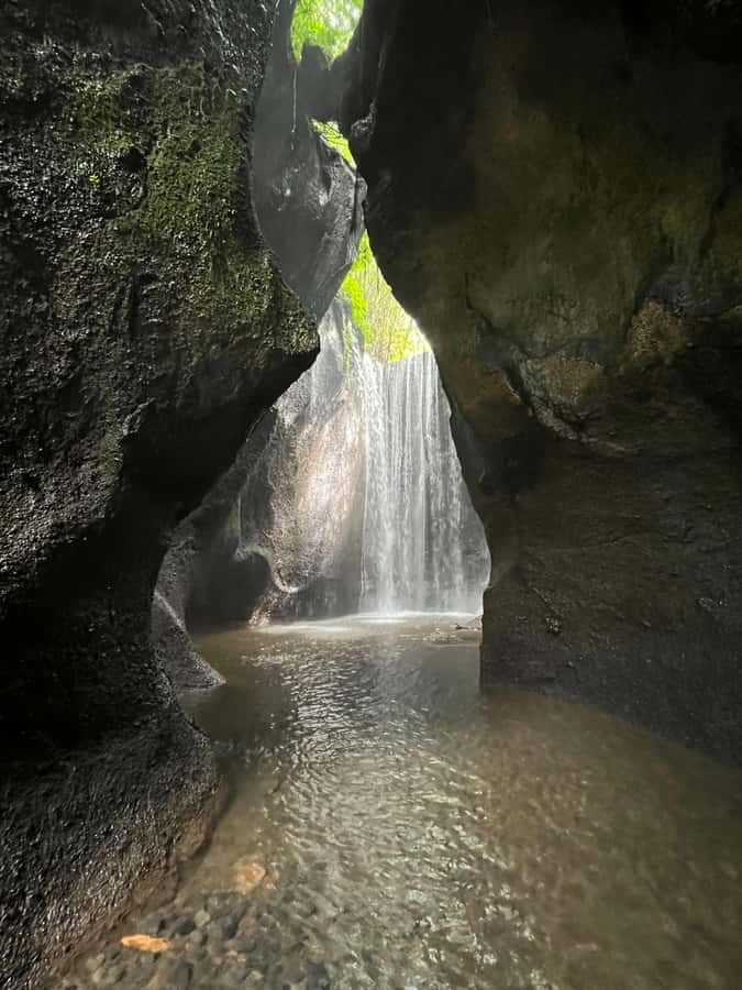 Ubud: Hidden Gems and Waterfalls Private Tour - Goa Raja Waterfall: A Cave Setting and a Swim When Conditions Allow