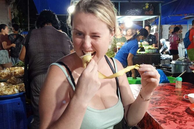 Ubud Night Traditional Market Food Tour - First tastings: traditional cakes and the Megibung theme
